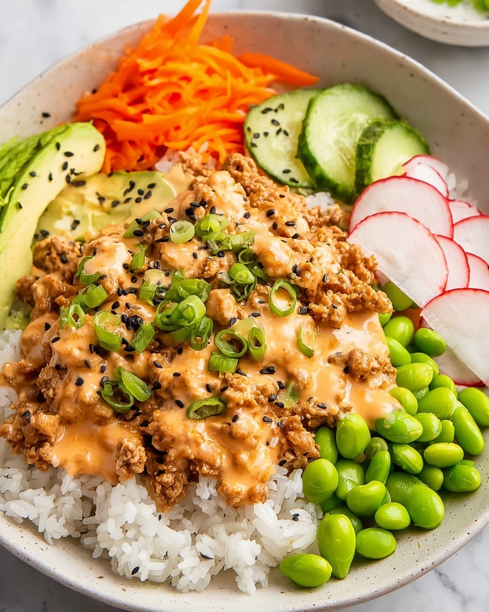 The image shows a white plate filled with a colorful dish. On the left, there is a layer of white rice sprinkled with black sesame seeds. Next to it is a thick layer of cooked ground meat covered in a creamy orange sauce, topped with chopped green onions. Behind the meat are bright green edamame beans. Toward the back, there are sliced cucumber pieces and shredded orange carrots. The plate is set on a white marbled surface, and a woman's hand with chopsticks is seen reaching from the right. photo taken with an iphone --ar 4:5 --v 7