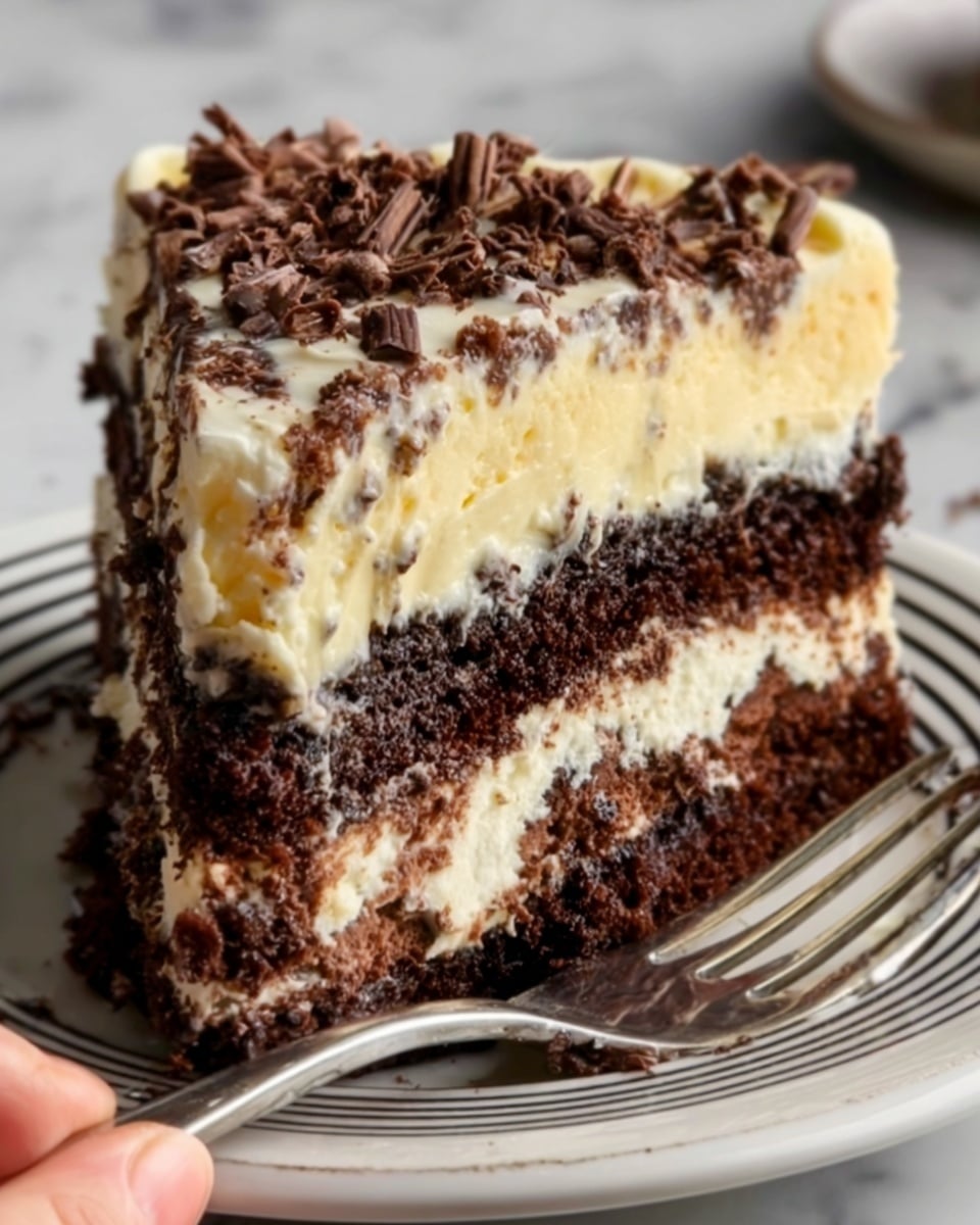 A close-up of a slice of layered chocolate and cream cake on a white plate with black lines. The cake has three main layers: the bottom and middle layers are rich, dark chocolate with a slightly crumbly texture, and the top layer is thick, smooth cream with a pale yellow color. Between each layer, there is creamy frosting that looks soft and light, with small chocolate shavings scattered on top. The slice is slightly uneven, showing the moist texture of the chocolate layers and the thick cream layers. A woman's hand holds the fork near the plate, ready to take a bite. The background is a white marbled surface. photo taken with an iphone --ar 4:5 --v 7