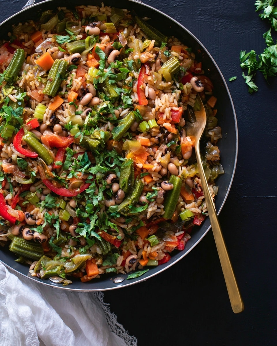 A pan filled with a mixed rice dish containing two main layers: the base layer is light brown and white rice mixed with black-eyed peas, topped with a colorful layer of vegetables including bright green okra slices, orange carrot chunks, pale green celery pieces, translucent cooked onions, and red bell pepper strips. Fresh green leafy herbs are scattered over the top for garnish. A gold fork rests on the right side inside the pan, and the pan is placed on a dark background with a white marbled texture partly visible. photo taken with an iphone --ar 4:5 --v 7