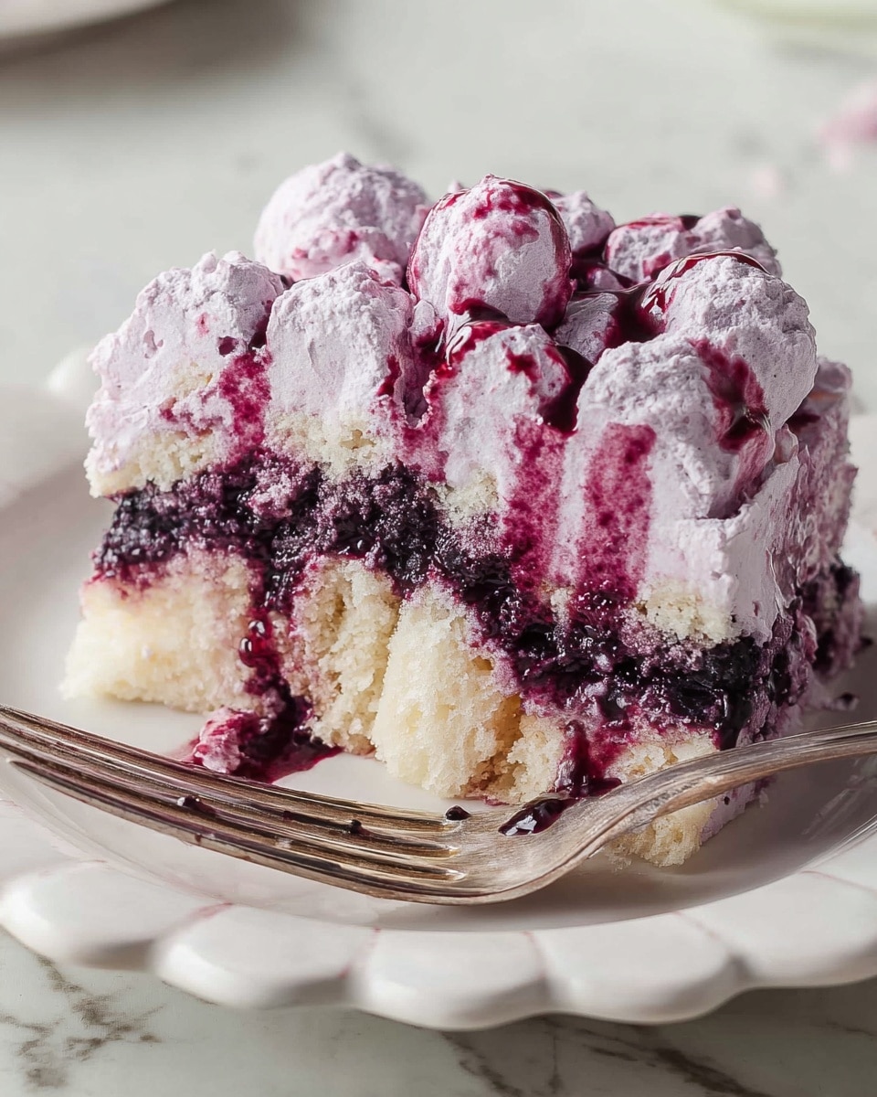 A three-layer square dessert sits on a white scalloped plate on a white marbled surface. The base and middle layers are made of light yellow sponge cake with a purple blueberry sauce soaked in between, creating uneven purple patches. The middle layer has a thick spread of light purple cream mixed with dark purple sauce. The top layer consists of round dollops of light purple mousse topped with dark purple blueberry syrup, arranged closely in a 3x3 grid. A single fresh blueberry rests at the plate's edge near the dessert. Photo taken with an iphone --ar 4:5 --v 7